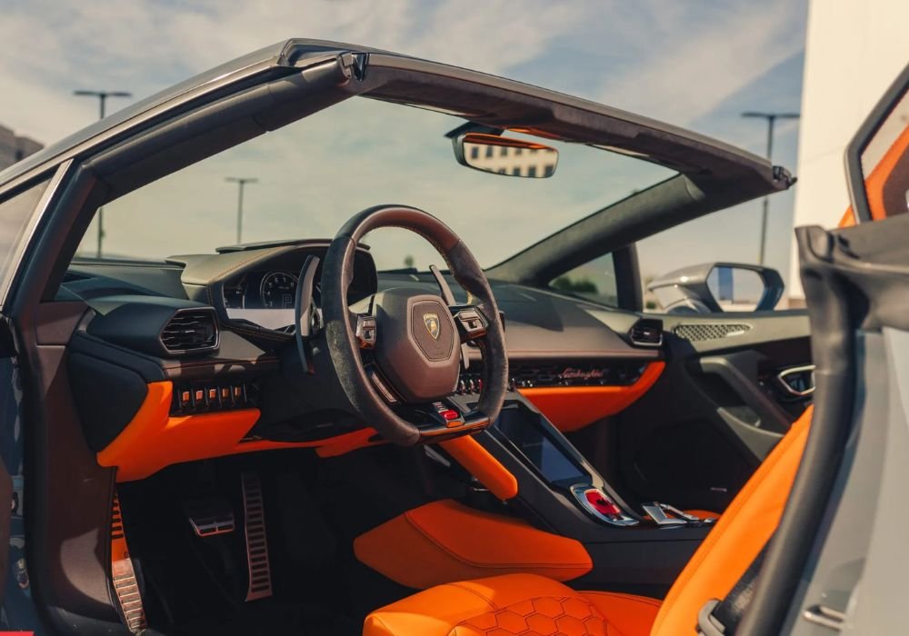Blue Lamborghini Huracan Evo Spyder for rent | Prestige Exotic